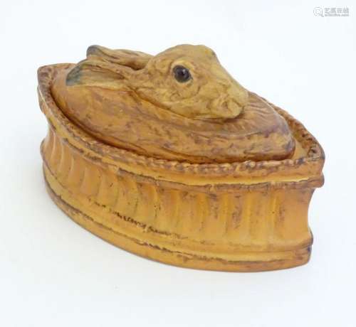 A Continental game pie dish formed as a baked pie with hare ...