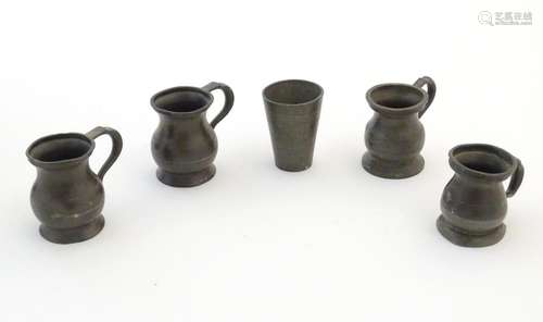 A quantity of 19thC pewter measures formed as tankards, vari...