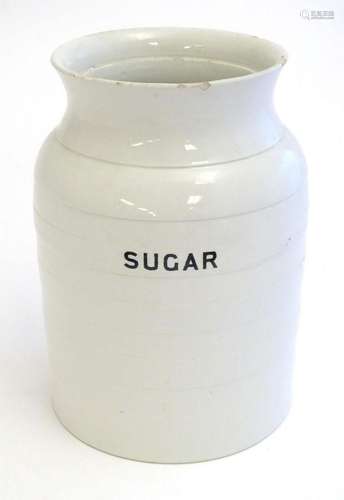 An early 20thC large ceramic sugar crock with banded detail....