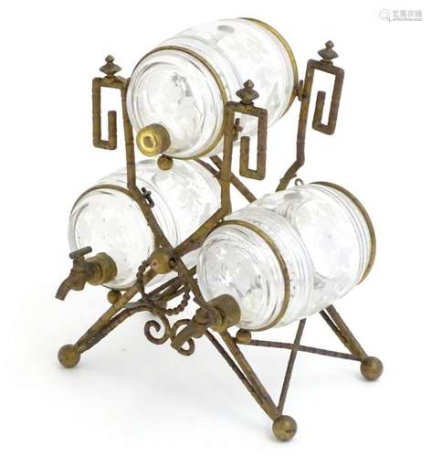 An unusual late 19thC / early 20thC decanter stand with thre...