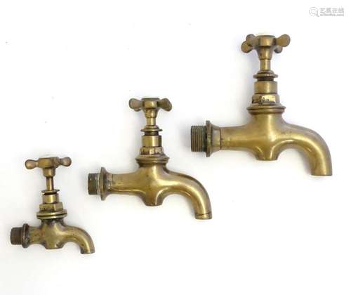 Three assorted Victorian brass taps. Largest approx. 6 3/4&q...