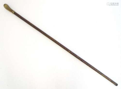 A 19thC walking cane / stick with horn handle. Approx. 35 1/...