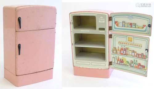Toys: An American child's tinplate retro toy refrigerat...