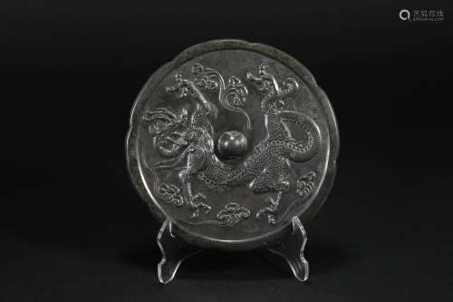 Han Dynasty bronze mirror with dragon pattern