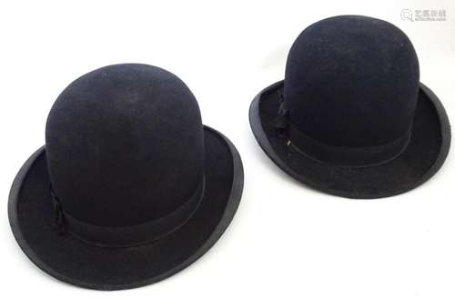 Two vintage black bowler hats, size 7 and size 12. One impre...