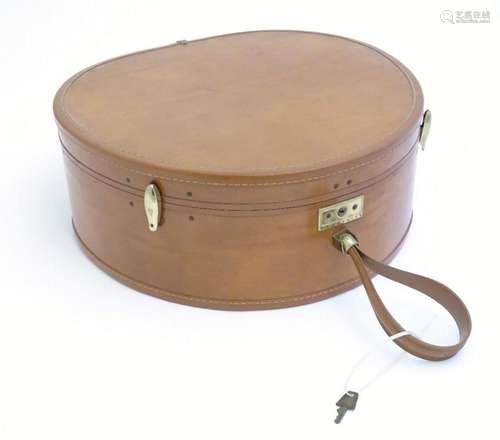 A vintage leather travelling / luggage hat box by Samsonite,...