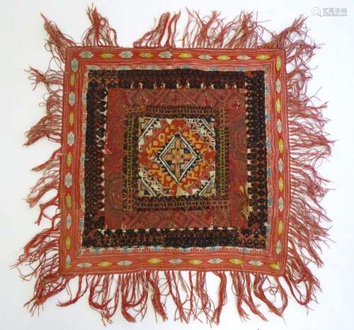 An embroidered patchwork textile panel of square form with s...