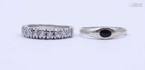 2 Silber Ringe 0.925 ,mit rund facc.klaren Steinen und schwa...