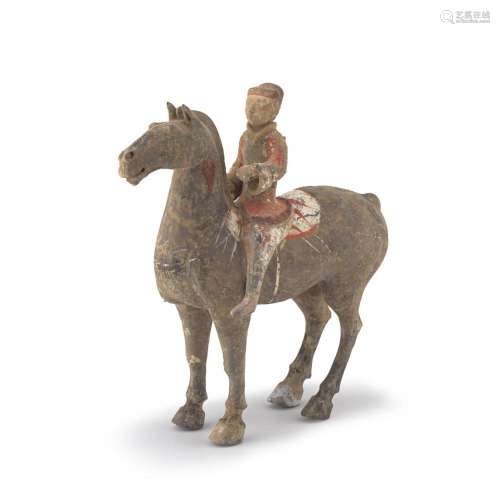 A Chinese painted pottery equestrian figure, Han Dynasty, 20...