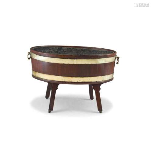 A George III mahogany and brass-bound wine cooler