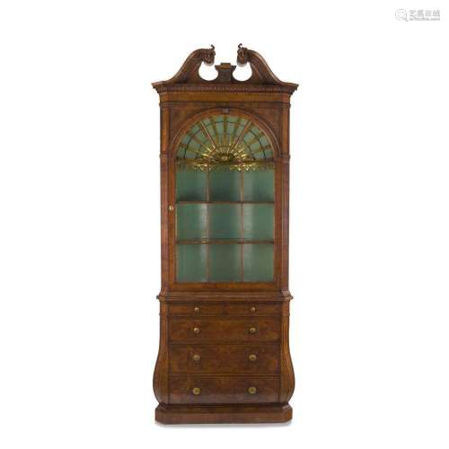 A Dutch walnut corner cupboard, 19th century