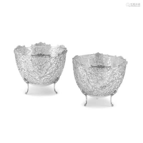 A pair of Dutch silver pierced and engraved baskets with imp...
