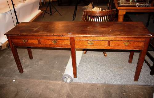 An antique elm side table, fitted four long drawers, 189cm