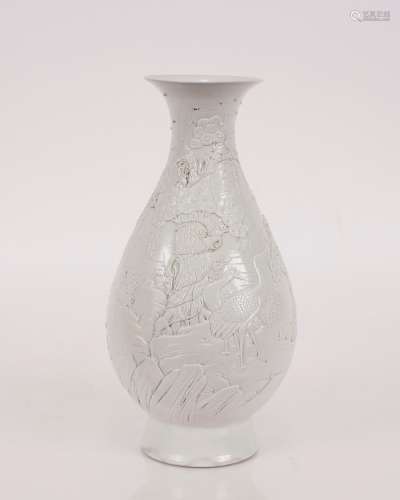 A 19th Century Chinese white glazed porcelain baluster vase,...