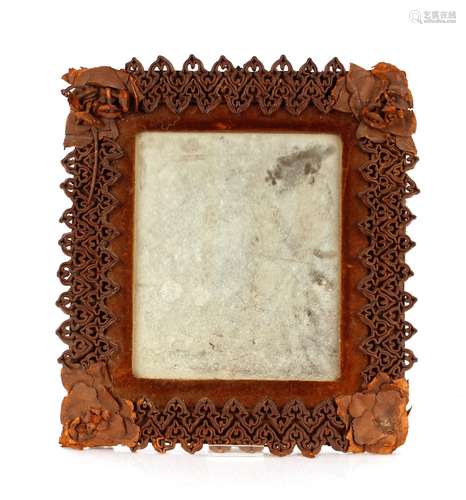 An unusual antique leather covered mirror, 48cm x 45cm