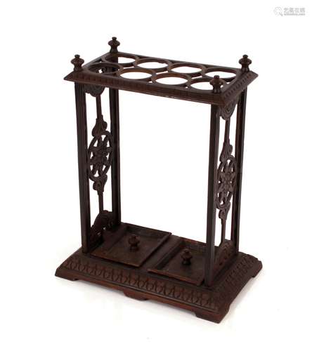 A Colbrookdale style cast iron umbrella stand, having pierce...