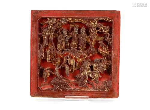 Two Chinese carved and lacquered panels, decorated figures a...