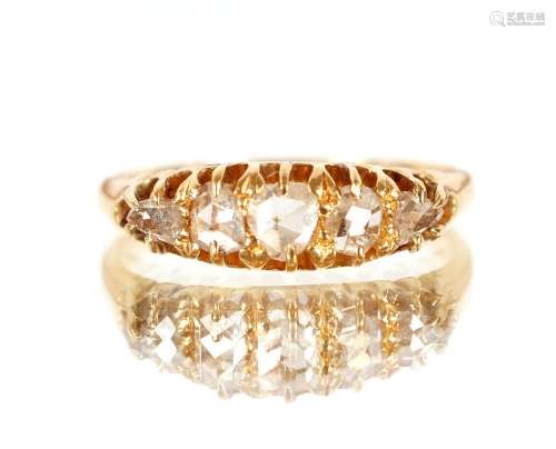A yellow metal ring, (marks rubbed) set five graduated diamo...