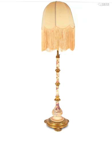 A large and ornate brass and floral pottery standard lamp, h...