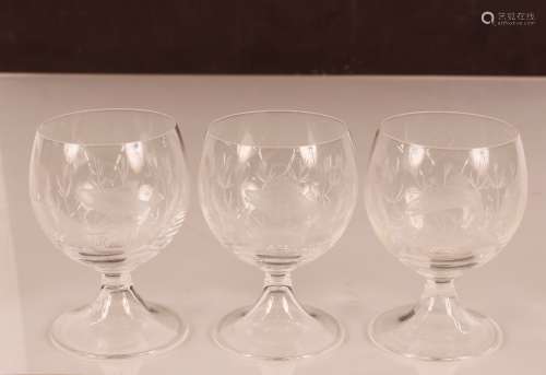Three glasses decorated with images of fish