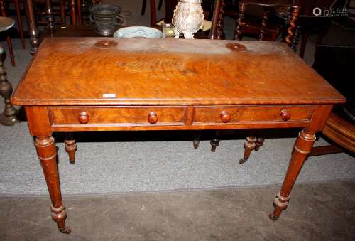 A Victorian walnut dressing table, fitted two drawers and ra...