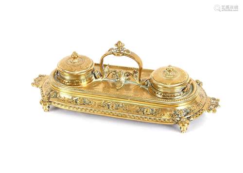 An ornate brass desk stand, with foliate decoration, 28cm