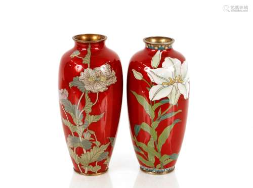 A cloisonné baluster vase, with floral decoration on a red g...