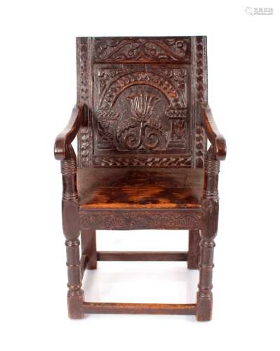 A 17h Century and later carved oak Wainscot chair, having pr...