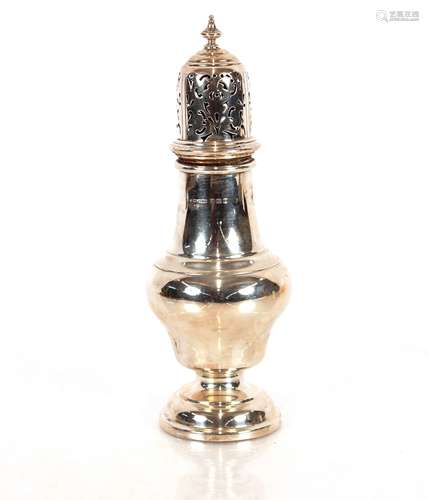 A large silver baluster sugar shaker, Birmingham 1938; 21cm ...