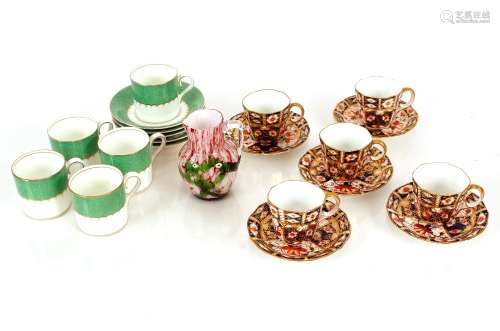 Five Royal Crown Derby Imari pattern coffee cans and saucers...