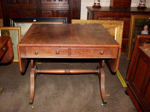 A George III mahogany sofa table, fitted two frieze drawers,...