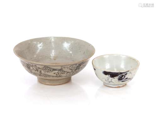 A Chinese blue and white bowl, with floral decoration raised...