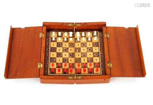 A Jaques mahogany cased travelling chess set