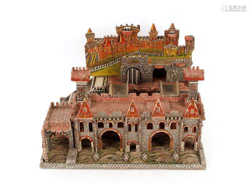A painted wooden toy fort, possibly Prisoner of War, 54cm wi...