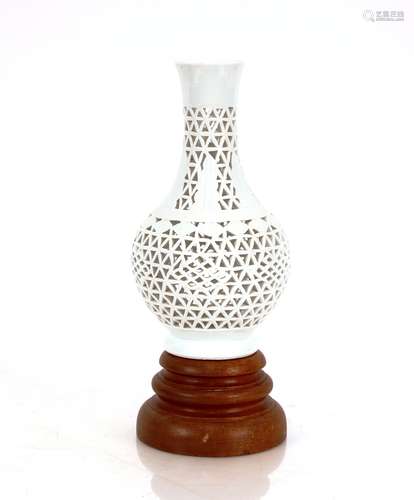 A Chinese blanc de chine vase, with pierced decoration on st...