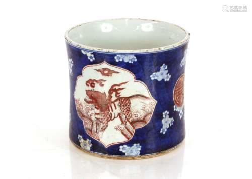 A large Chinese blue and white brush pot, having dragon and ...