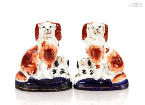 A pair of Staffordshire dogs, one AF