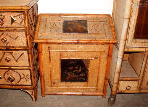 An unusual 19th Century bamboo sloping topped cabinet, havin...