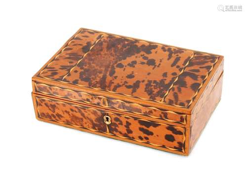 A 19th Century tortoiseshell inlaid workbox, 24.5cm wide