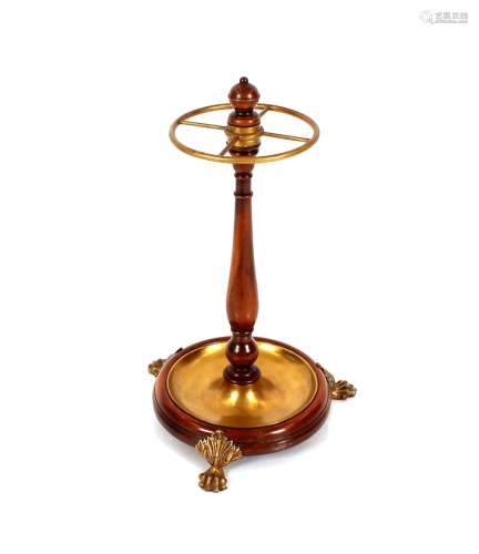 A mahogany and gilt mounted circular revolving sti