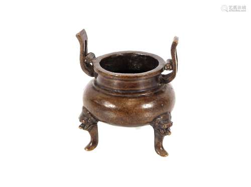 A Chinese bronze censer, of baluster form with elongated loo...