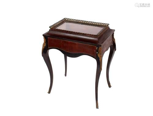 A French gilt metal mounted collector's table, raised on cab...