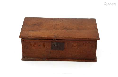 An 18th Century oak Bible box, the lid inscribed 