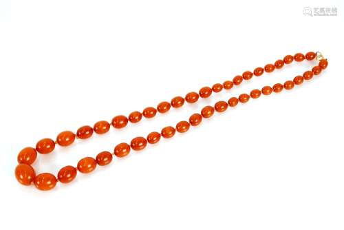A string of amber beads, 74cm long