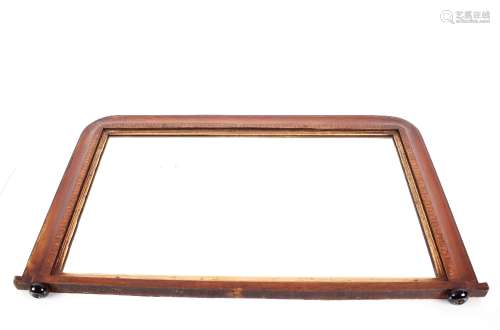 A late Victorian walnut and inlaid over mantel mirror