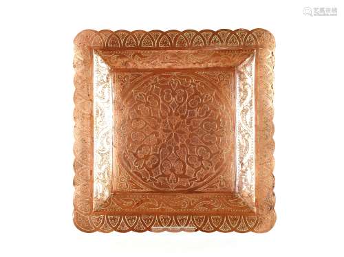 An Eastern copper tray, with stylised floral engraved decora...