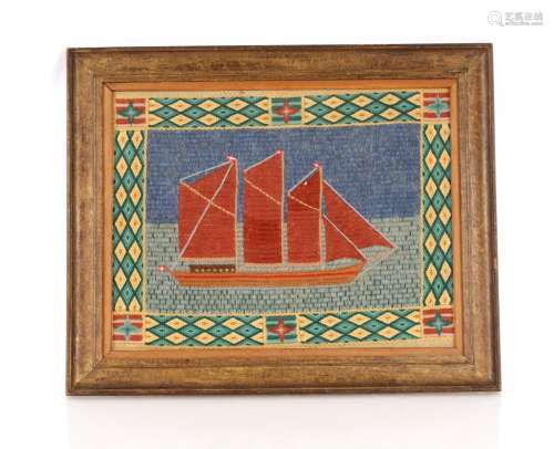 An antique wool work picture, depicting a sailing ship in gi...