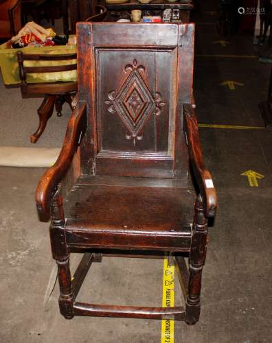 A 17th Century oak Wainscot chair, the back with lozenge sha...