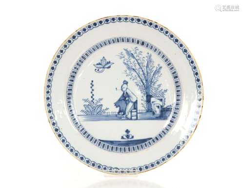 An 18th Century English Delftware blue and white charger, pa...