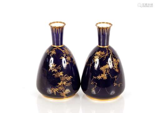 A pair of Royal Crown Derby vases, with gilt foliate trailin...